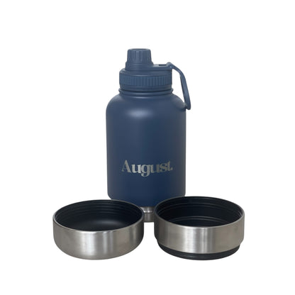 Harbour navy August dog water bottle styled for outdoor adventures  perfect for keeping pets hydrated on walks and hikes.